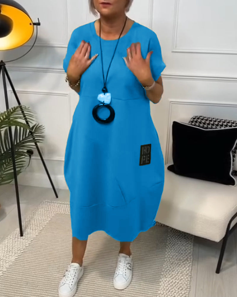 Maura | Relaxed Pocket Midi Dress